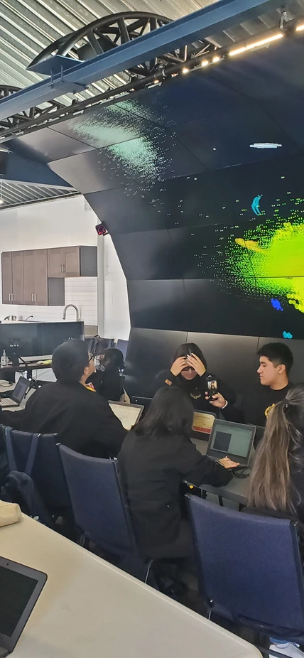 high school students learn about dark matter in the Carnegie Observatories VizLab as part of a DEI Mini-grant funded project