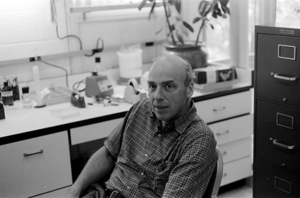 Caption: Donald Brown takes a break in the lab during the 1980s, when his group was investigating how different genes are expressed during embryonic development.  Photo is courtesy of the Carnegie Institution for Science.