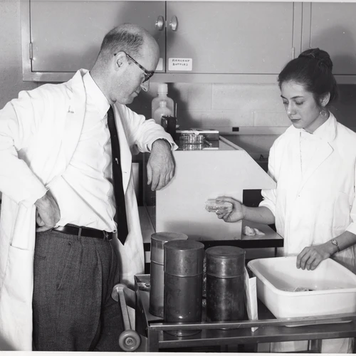 Dr. James D. Ebert (left) and Miss Nancy Sype working in the lab at the Department of Embryology