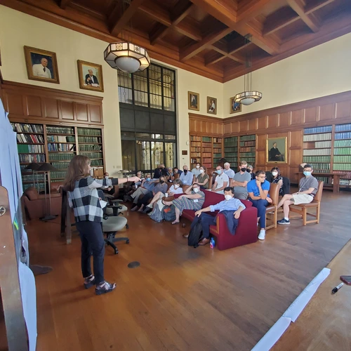 BSE staff gather for a spirited discussion in a Caltech library. 